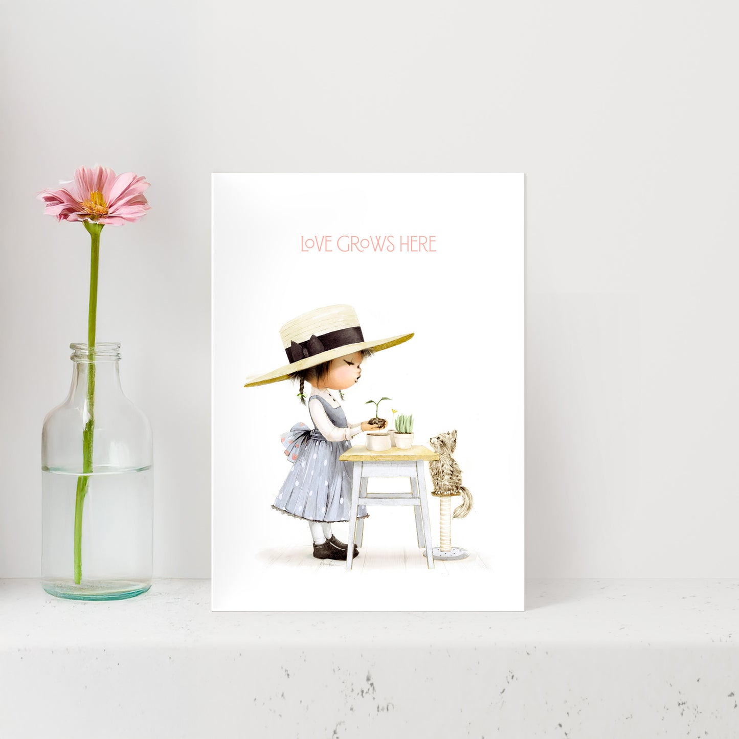 Illustration of a child in a polka dot dress and sun hat with a flower and bottle on a white background.