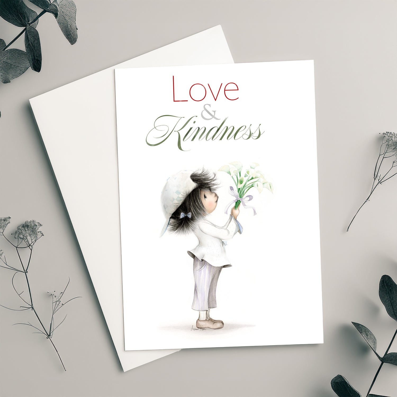 Greeting card with illustration of a child holding flowers and text 'Love & Kindness' on a light gray background.