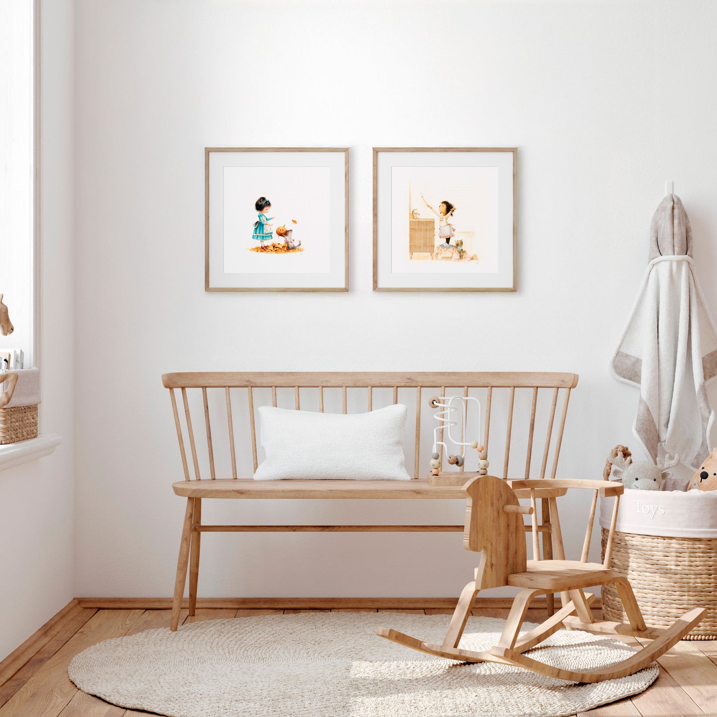 Nursery room with wooden bench, rocking chair, and framed pictures of Danbi on a white wall.