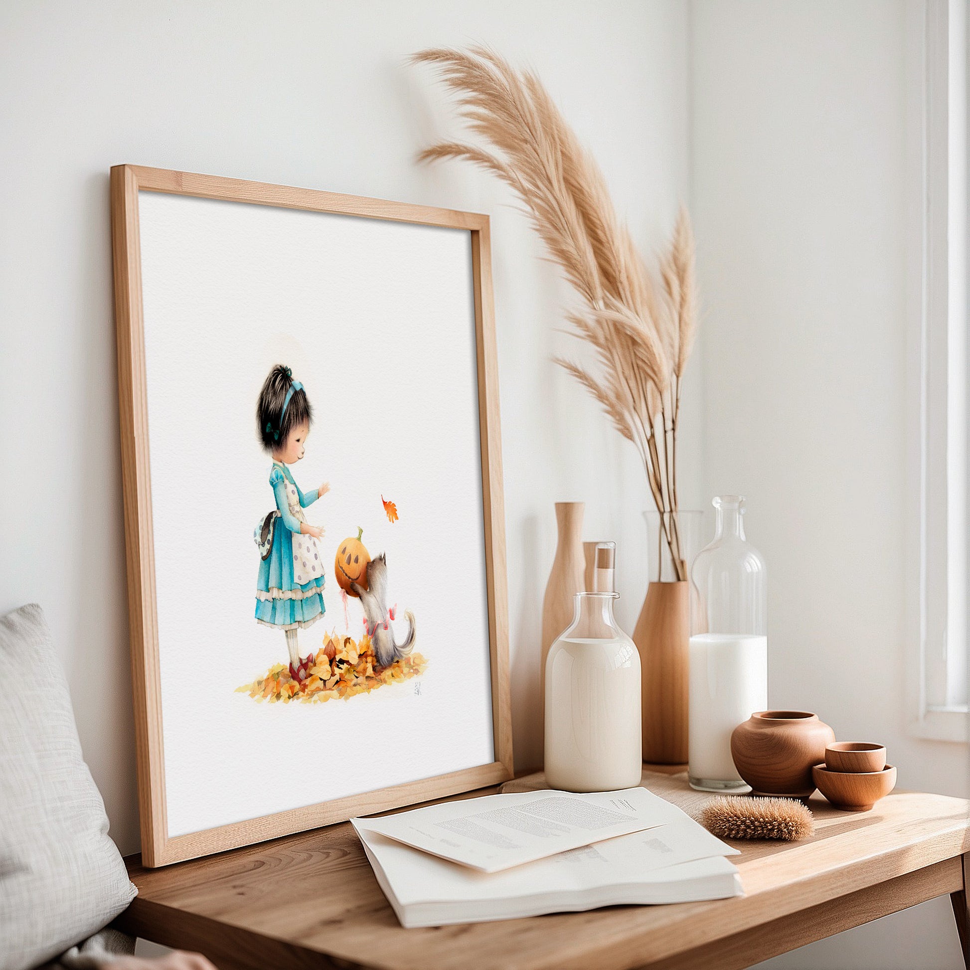 Framed artwork of a child with a pumpkin on a wooden table with decorative items.