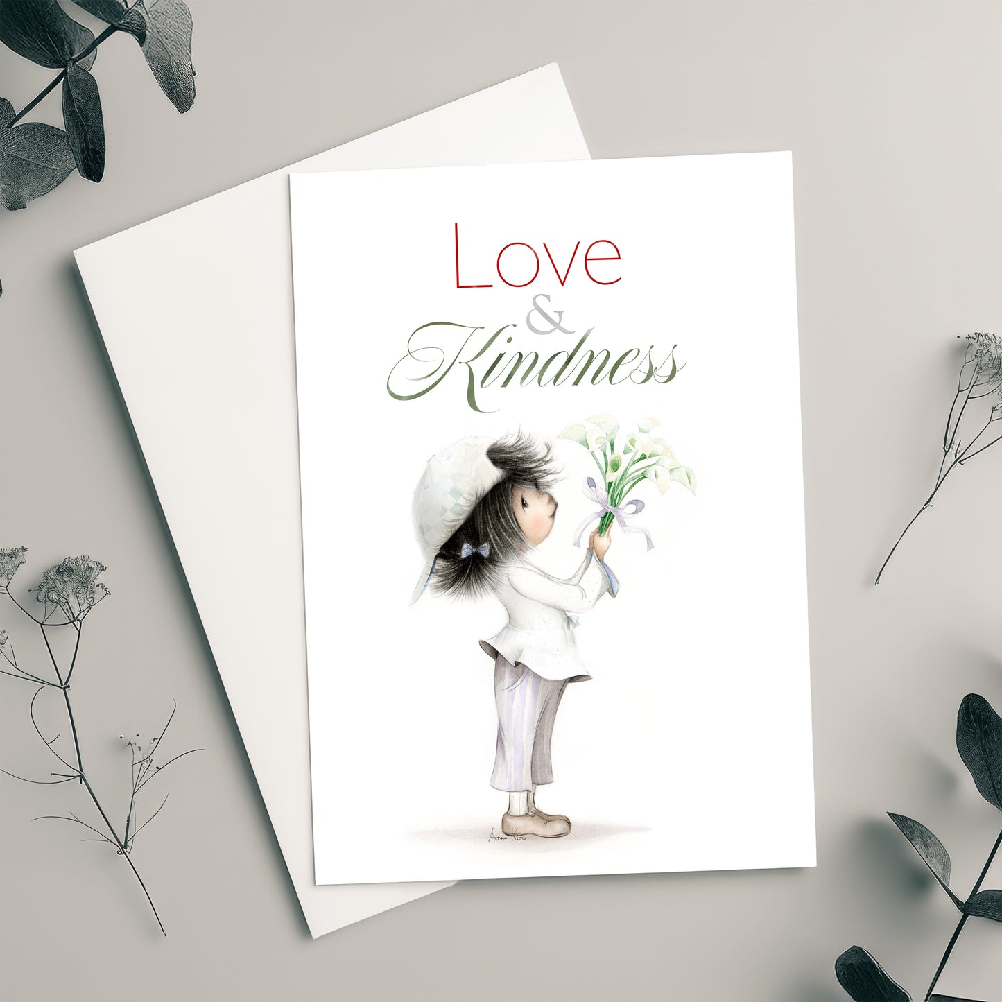 Greeting card with an illustration of a child holding flowers and the text 'Love & Kindness' on a light gray background.