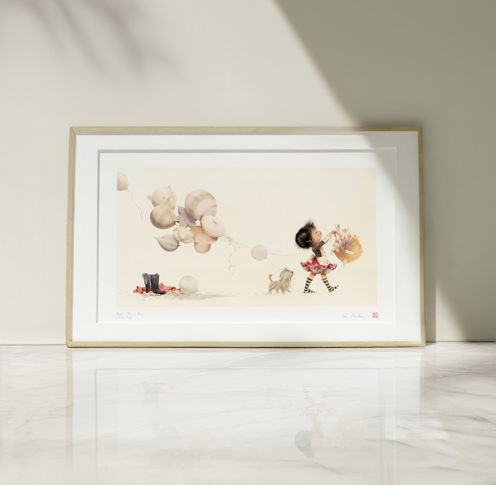 Framed artwork of a girl with balloons on a white wall